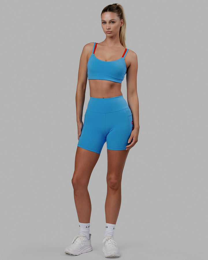 Woman wearing Structure Sports Bra - Azure Blue-Infrared