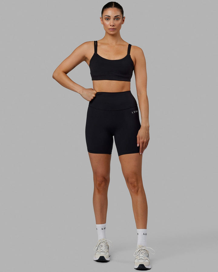 Woman wearing Structure Sports Bra - Black
