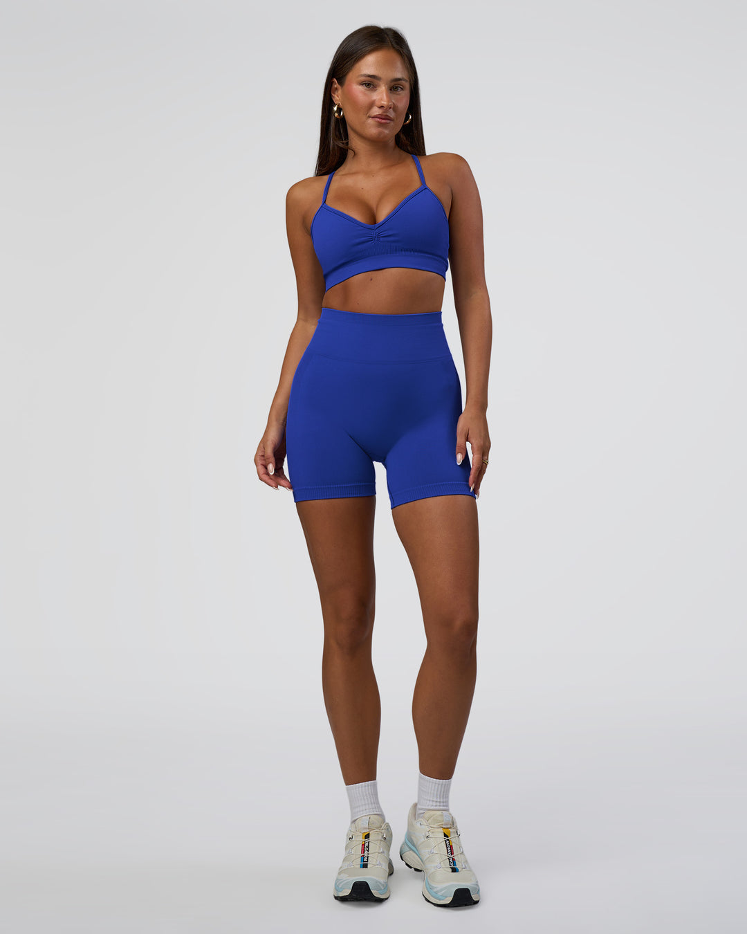 Woman wearing Surge Seamless High-Rise 6" Short - Power Cobalt | Model:Bianca | Size:S
