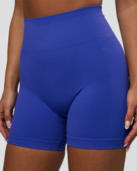 Woman wearing Surge Seamless High-Rise 6" Short - Power Cobalt | Model:Bianca | Size:S