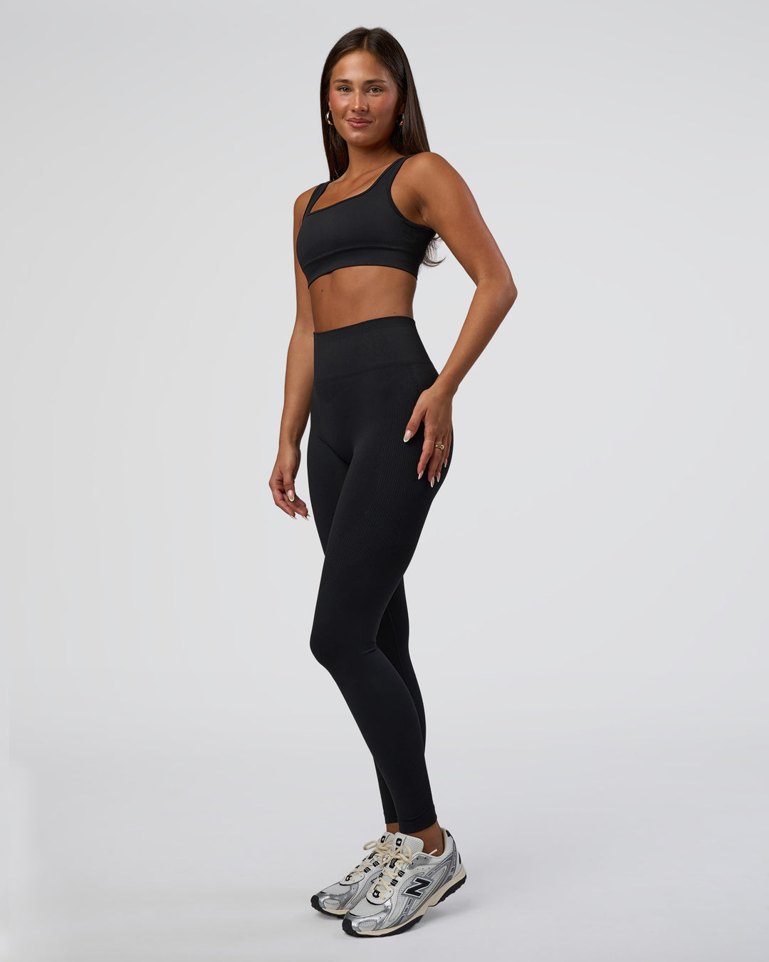 Woman wearing Surge Seamless High-Rise Full Length Legging - Black | Model:Bianca | Size:S