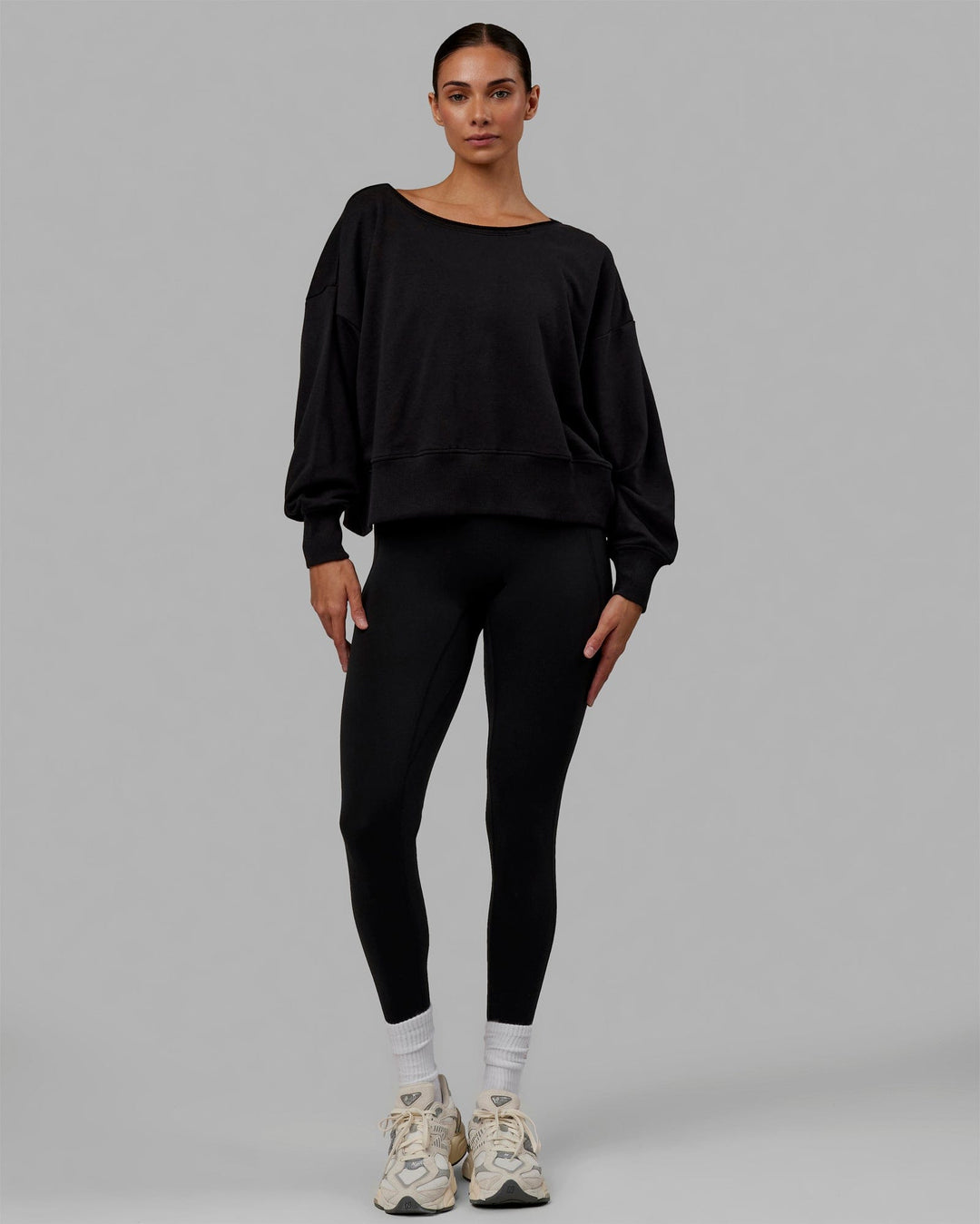Woman wearing Tempo Sweater - Black