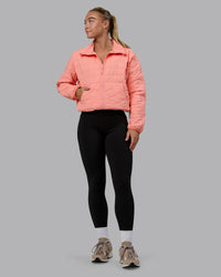 Woman wearing Thrive Packable Jacket - Murex Shell