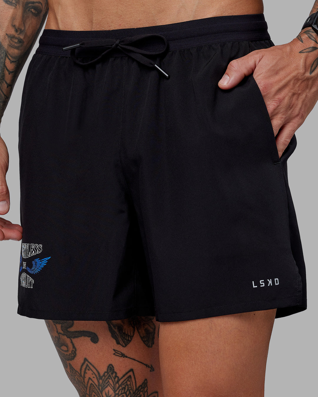 Man wearing Tommy Newell Pace 5&quot; Lined Performance Short - Black | Model:Tommy | Size:S