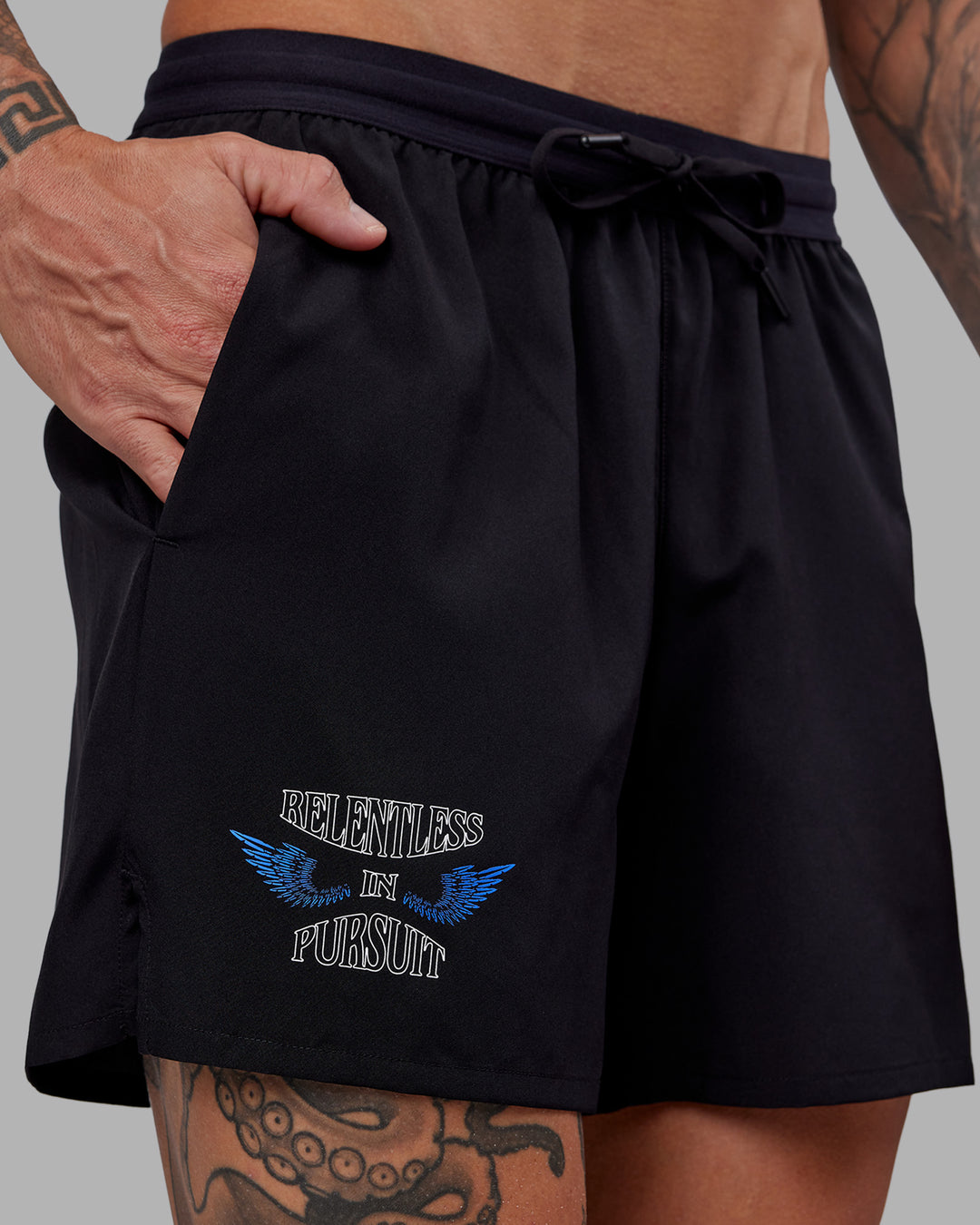 Man wearing Tommy Newell Pace 5&quot; Lined Performance Short - Black | Model:Tommy | Size:S