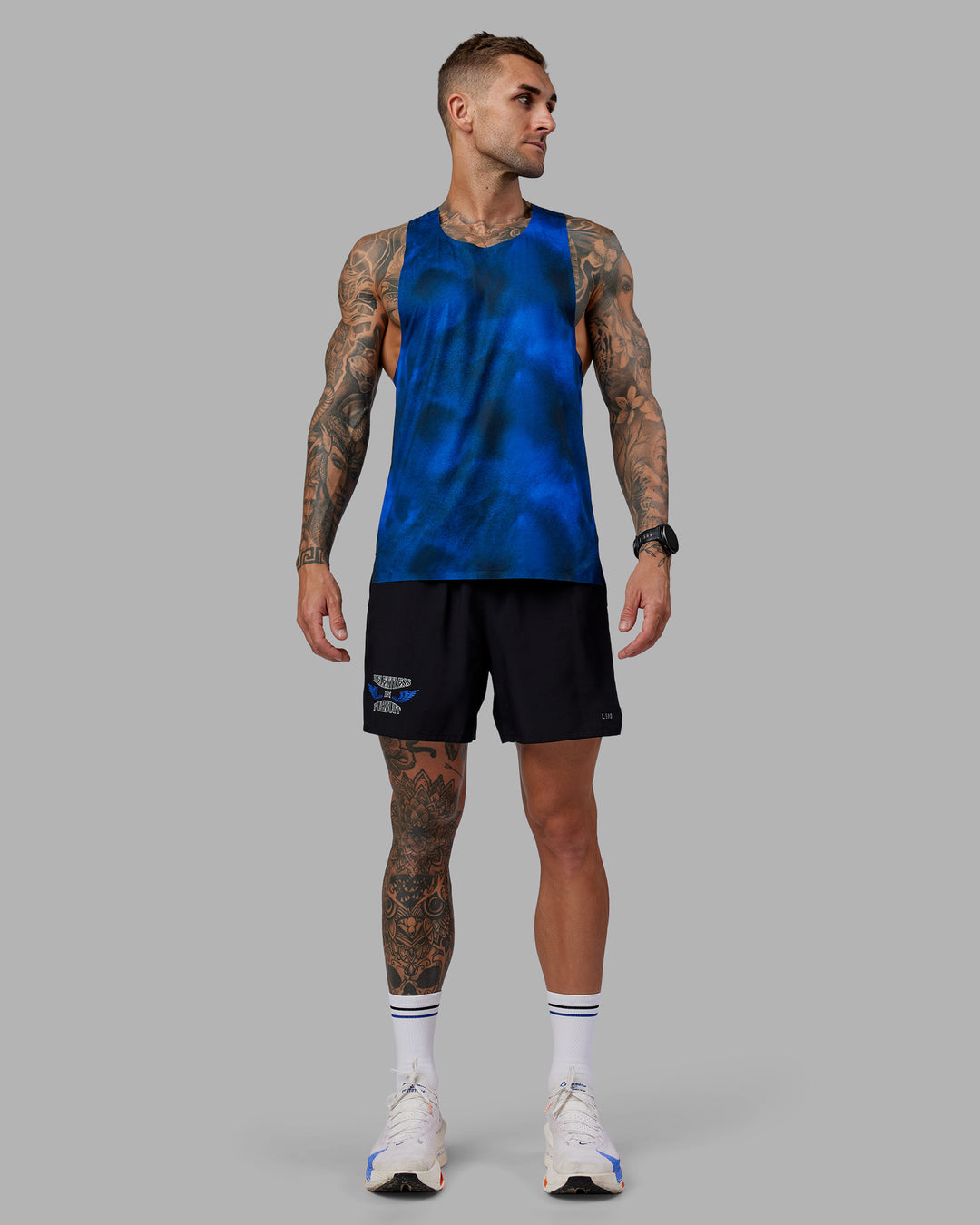 Man wearing Tommy Newell Pace 5&quot; Lined Performance Short - Black | Model:Tommy | Size:S