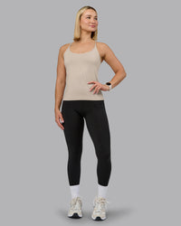 Woman wearing Transition CloudFLX Shelf Bra Tank - Shale Beige | Model:Halle | Size:S