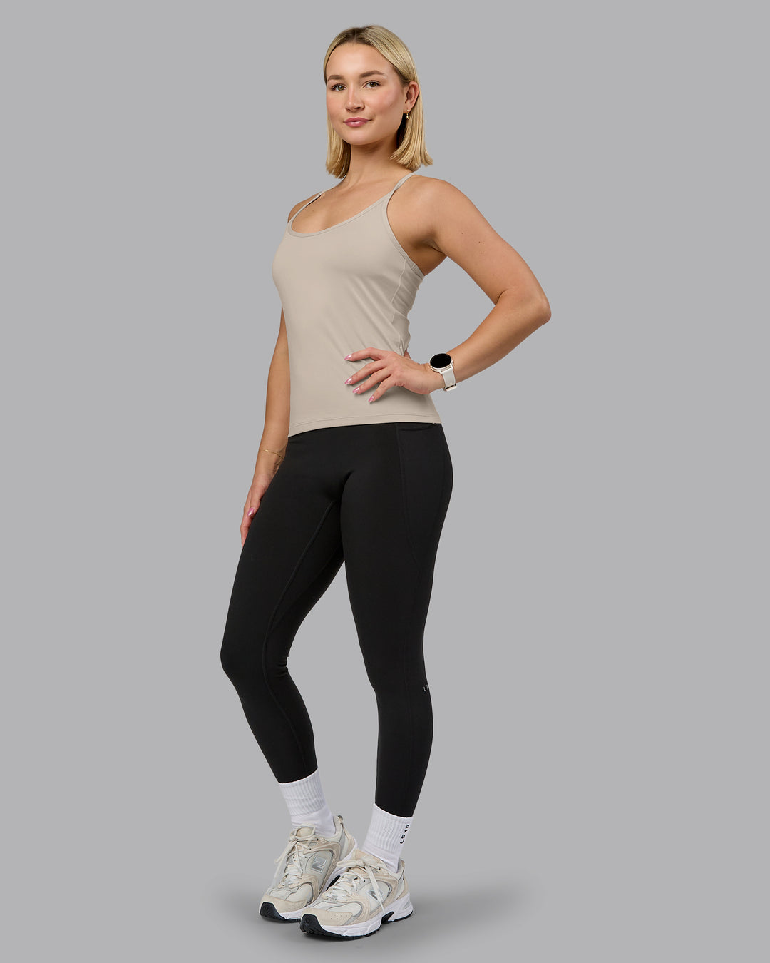 Woman wearing Transition CloudFLX Shelf Bra Tank - Shale Beige | Model:Halle | Size:S