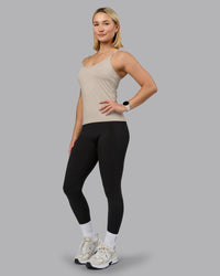 Woman wearing Transition CloudFLX Shelf Bra Tank - Shale Beige | Model:Halle | Size:S