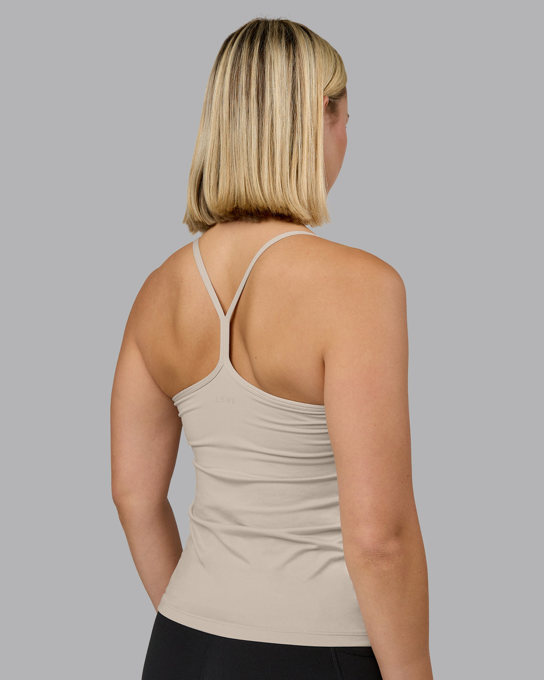 Woman wearing Transition CloudFLX Shelf Bra Tank - Shale Beige | Model:Halle | Size:S