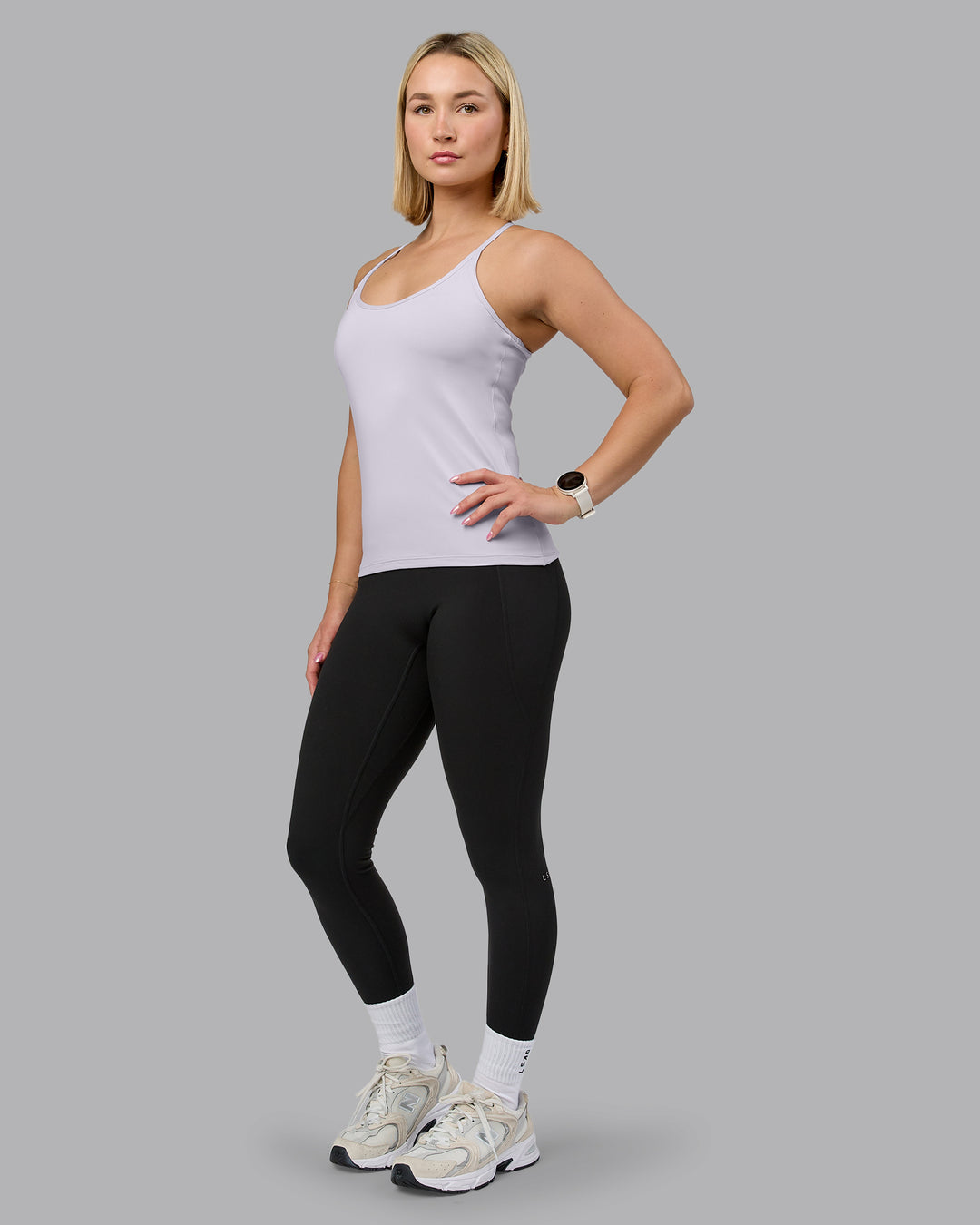 Woman wearing Transition CloudFLX Shelf Bra Tank - Soft Grey | Model:Halle | Size:S