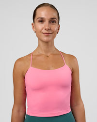 Woman wearing Twister Shelf Bra Tank - Candy Pink | Model:Myrte | Size:S