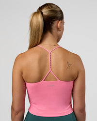 Woman wearing Twister Shelf Bra Tank - Candy Pink | Model:Myrte | Size:S