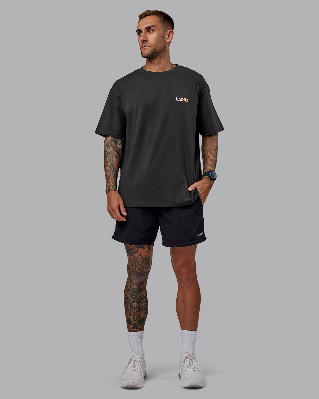Man wearing Unisex E.T.J FLXCotton Tee Oversize - Pirate Black-Pop Pink