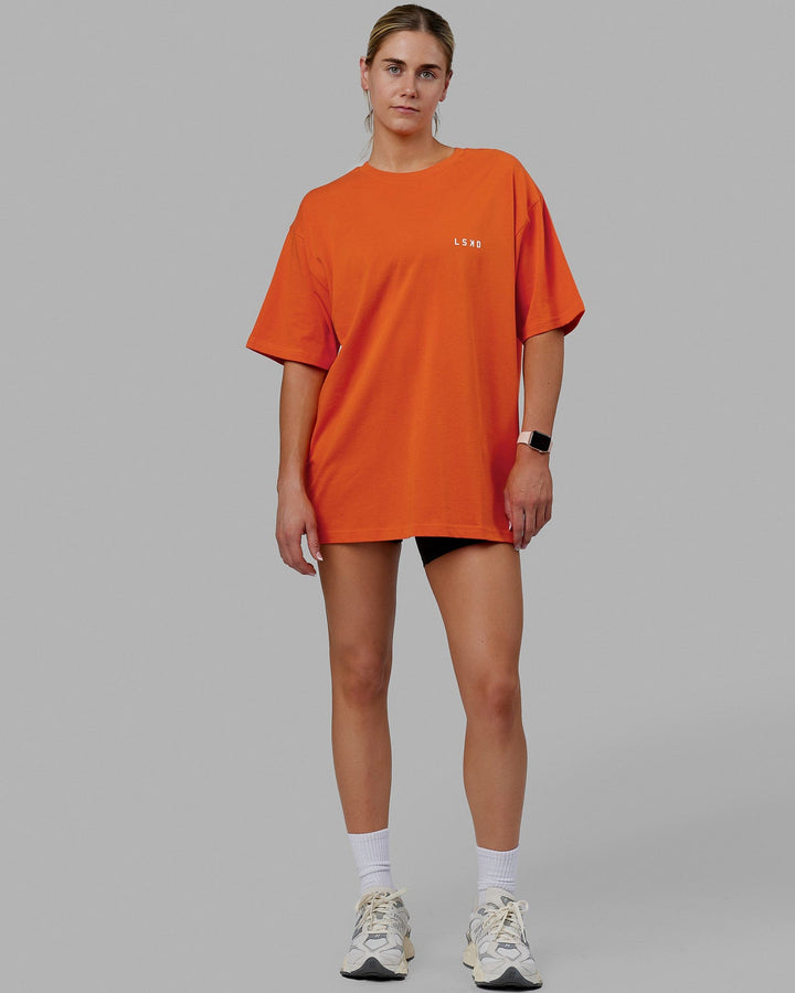 Woman wearing Unisex Endeavour Heavyweight Tee Oversize - Impact Orange