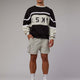 Man wearing Unisex PrimeTime Sweater Oversize - Black-Bone