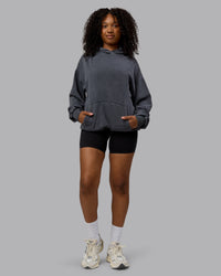 Woman wearing Unisex Washed Set the Standard Hoodie Oversize - Black-Greyish Purple