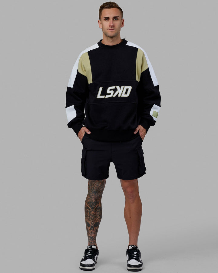 Man wearing Unisex Slam Sweater Oversize - Black-Gold
