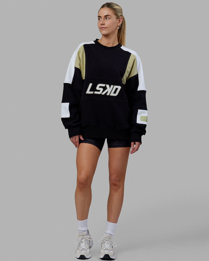 Woman wearing Unisex Slam Sweater Oversize - Black-Gold