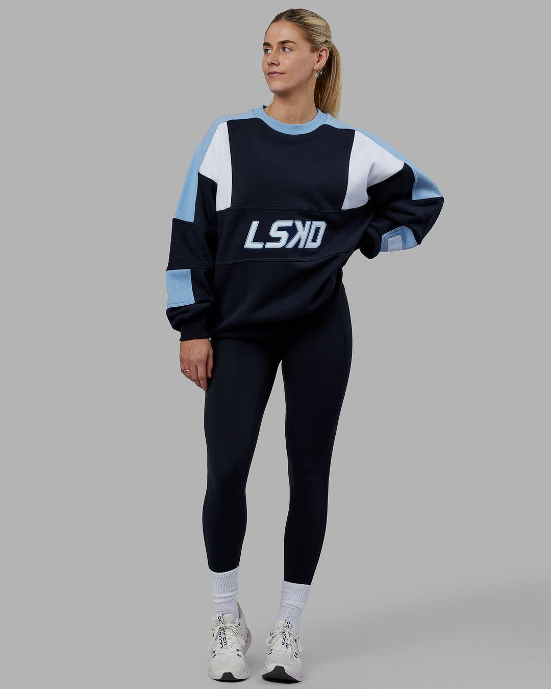 Woman wearing Unisex Slam Sweater Oversize - Navy-Blue