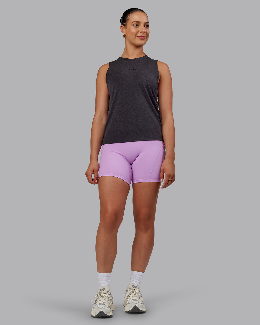 Woman wearing Unleash Training Tank - Charcoal Marl