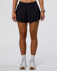Woman wearing Unstoppable Lined Short - Black | Model:Emelia | Size:S