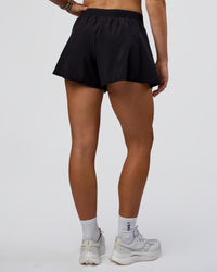 Woman wearing Unstoppable Lined Short - Black | Model:Emelia | Size:S