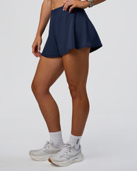 Woman wearing Unstoppable Lined Short - Future Navy | Model:Emelia | Size:S