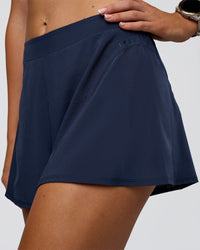 Woman wearing Unstoppable Lined Short - Future Navy | Model:Emelia | Size:S