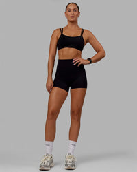 Woman wearing Vantage Sports Bra - Black