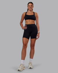 Woman wearing Velocity Sports Bra - Black | Model:Phoebe | Size:S