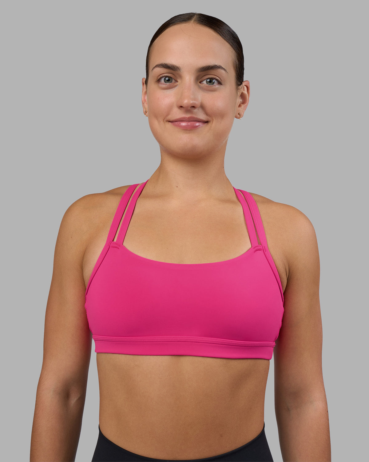 Woman wearing Velocity Sports Bra - Ultra Pink | Model:Keisha | Size:S