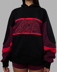 Woman wearing Vibe Oversized Unisex Hoodie - Black-Cherry Lacquer | Model:Rhiley | Size:S | Thumbnail Index: 8