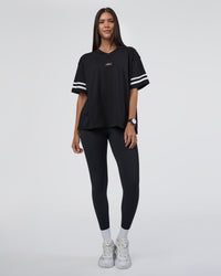 Woman wearing Victory FLXCotton Oversized Tee - Black-White | Model:Rhiley | Size:S