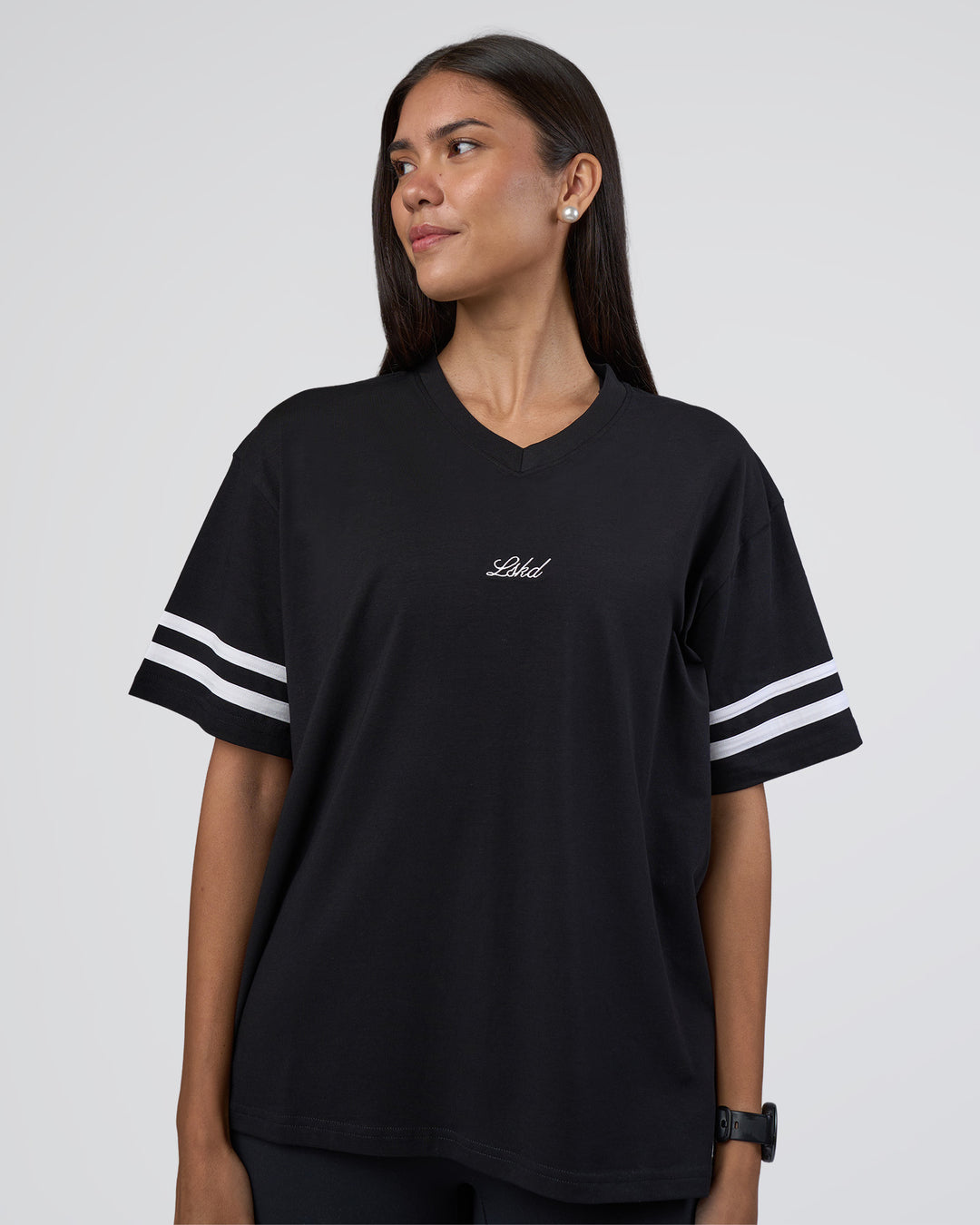 Woman wearing Victory FLXCotton Oversized Tee - Black-White | Model:Rhiley | Size:S
