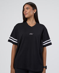 Woman wearing Victory FLXCotton Oversized Tee - Black-White | Model:Rhiley | Size:S