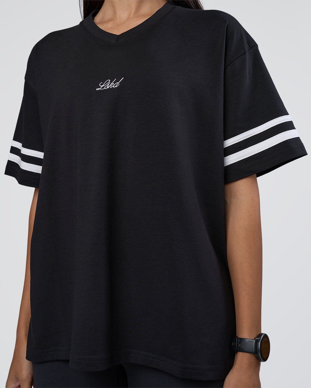 Woman wearing Victory FLXCotton Oversized Tee - Black-White | Model:Rhiley | Size:S