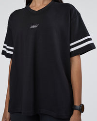 Woman wearing Victory FLXCotton Oversized Tee - Black-White | Model:Rhiley | Size:S