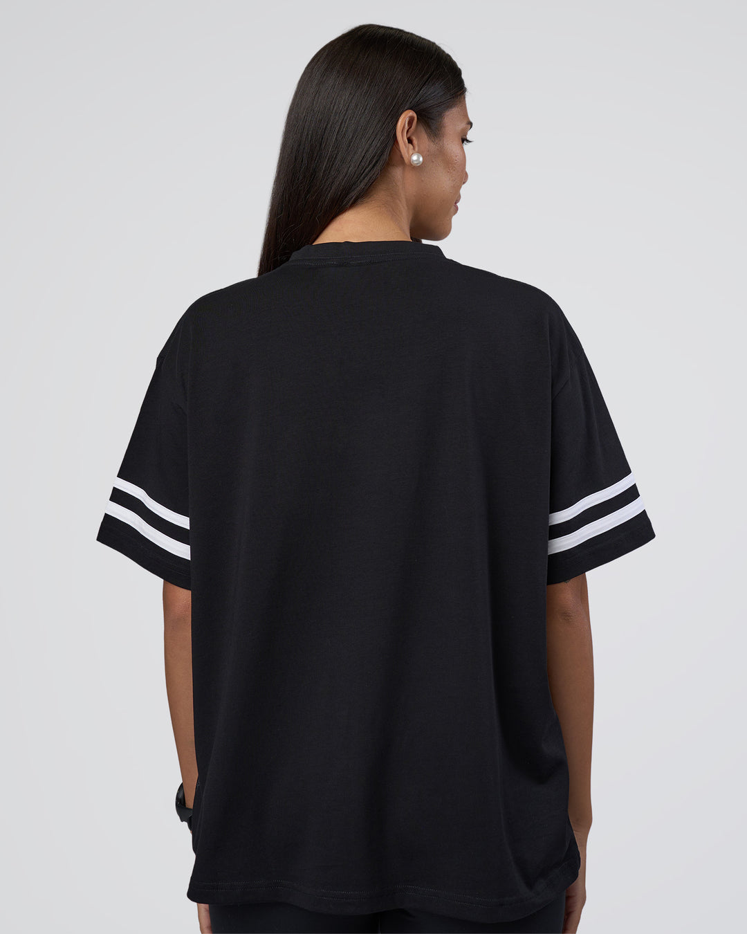 Woman wearing Victory FLXCotton Oversized Tee - Black-White | Model:Rhiley | Size:S