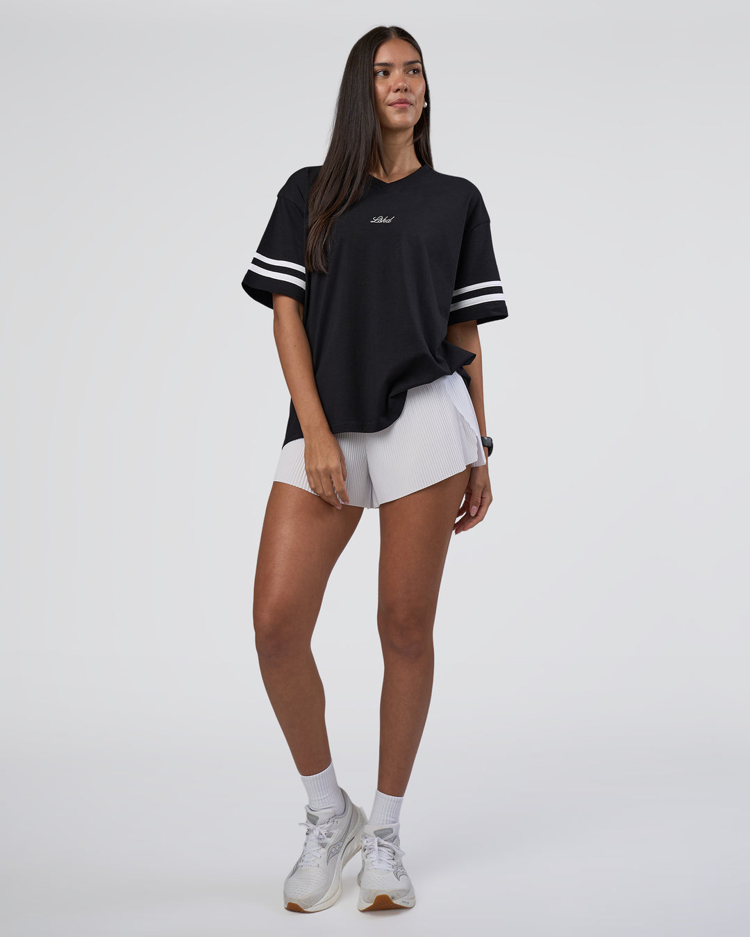 Woman wearing Victory FLXCotton Oversized Tee - Black-White | Model:Rhiley | Size:S