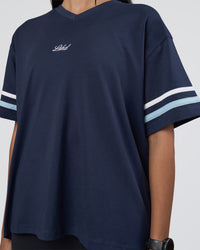 Woman wearing Victory FLXCotton Oversized Tee - Future Navy-Glacial Blue | Model:Rhiley | Size:S