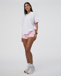 Woman wearing Victory FLXCotton Oversized Tee - White-Marshmallow | Model:Rhiley | Size:S