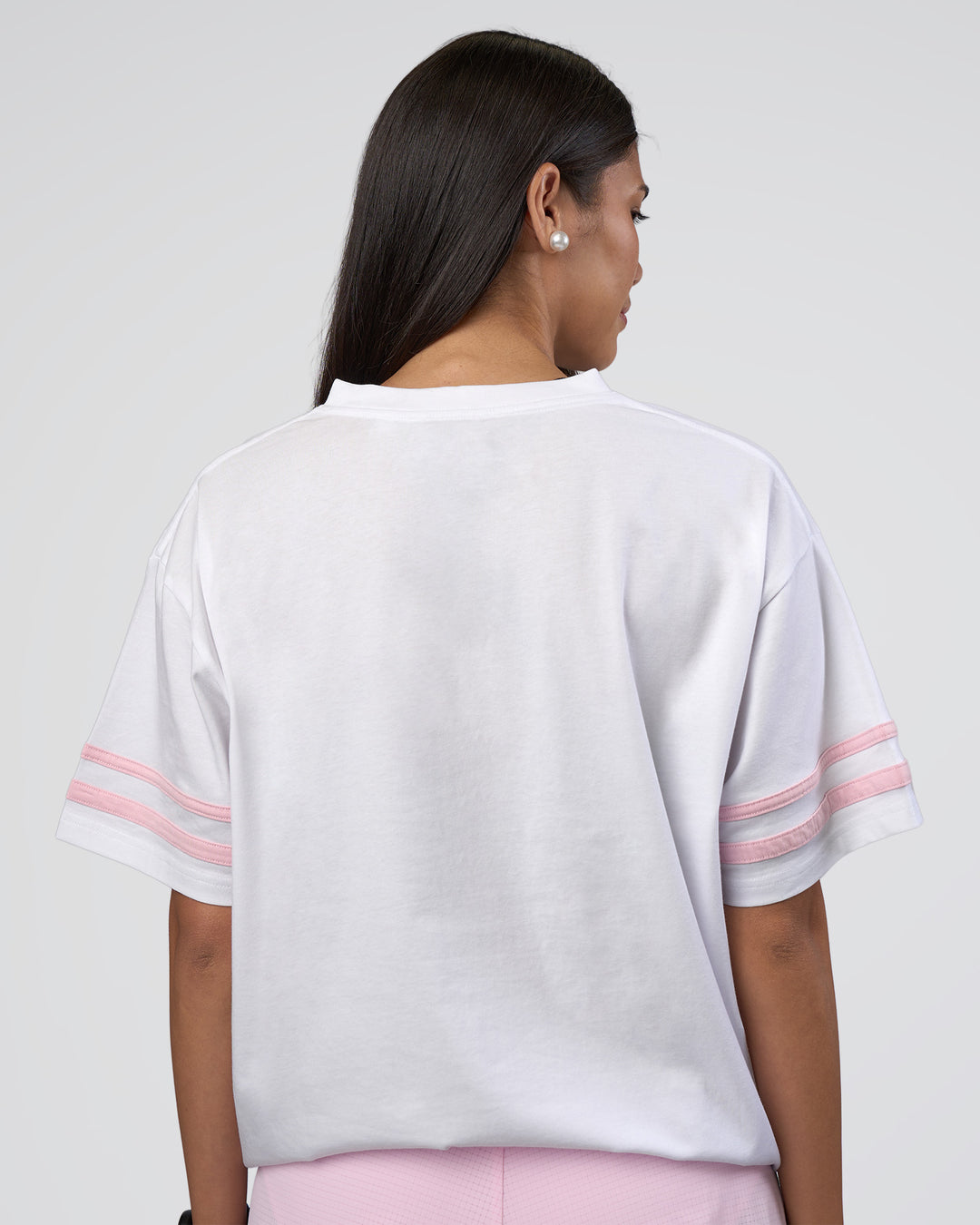 Woman wearing Victory FLXCotton Oversized Tee - White-Marshmallow | Model:Rhiley | Size:S
