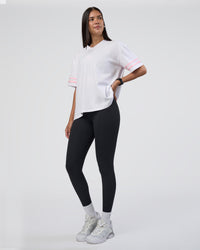 Woman wearing Victory FLXCotton Oversized Tee - White-Marshmallow | Model:Rhiley | Size:S