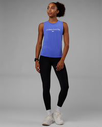 Woman wearing Vital 1% Better Training Tank - Power Cobalt-White