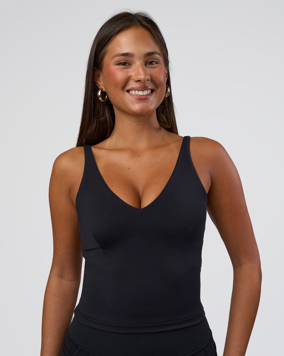 Woman wearing Vitality Active Tank - Black | Model:Bianca | Size:S