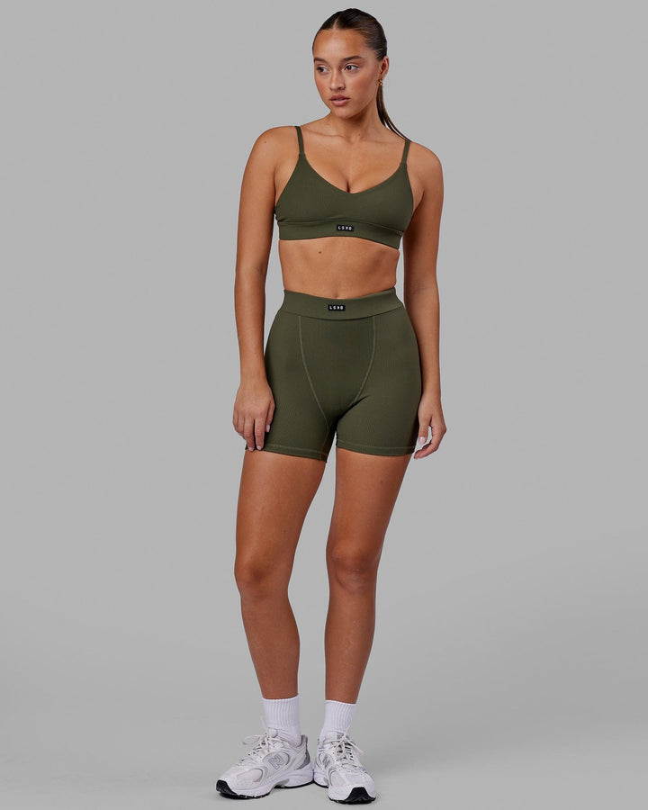 Woman wearing Vitalise Ribbed Mid Short - Forest Night