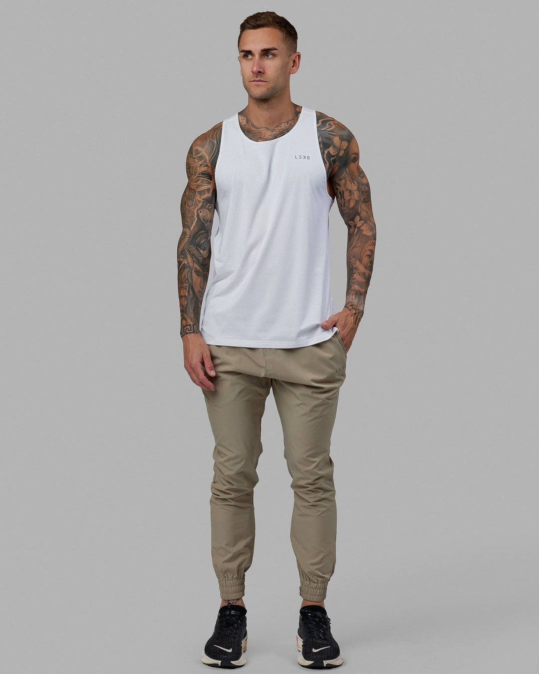 Man wearing Warm Up Zip Cuff Performance Jogger - Laurel Oak