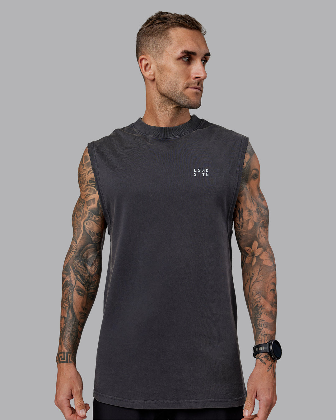 Man wearing Washed Relentless Heavyweight Oversized Tank - Black-Grey | Model:Tommy | Size:S