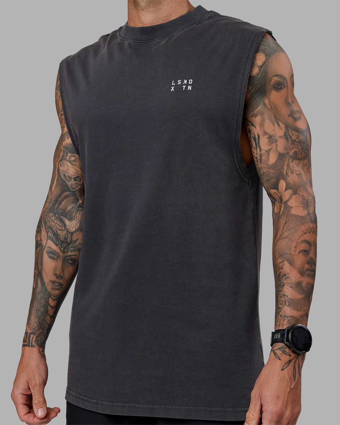Man wearing Washed Relentless Heavyweight Oversized Tank - Black-Grey | Model:Tommy | Size:S